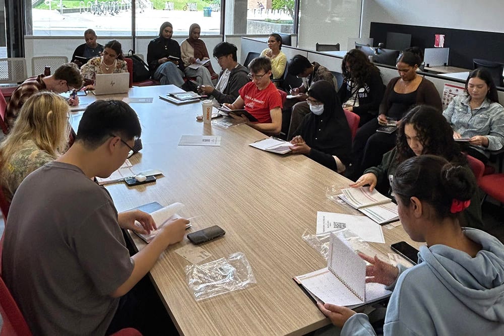 Students learning together in a workshop